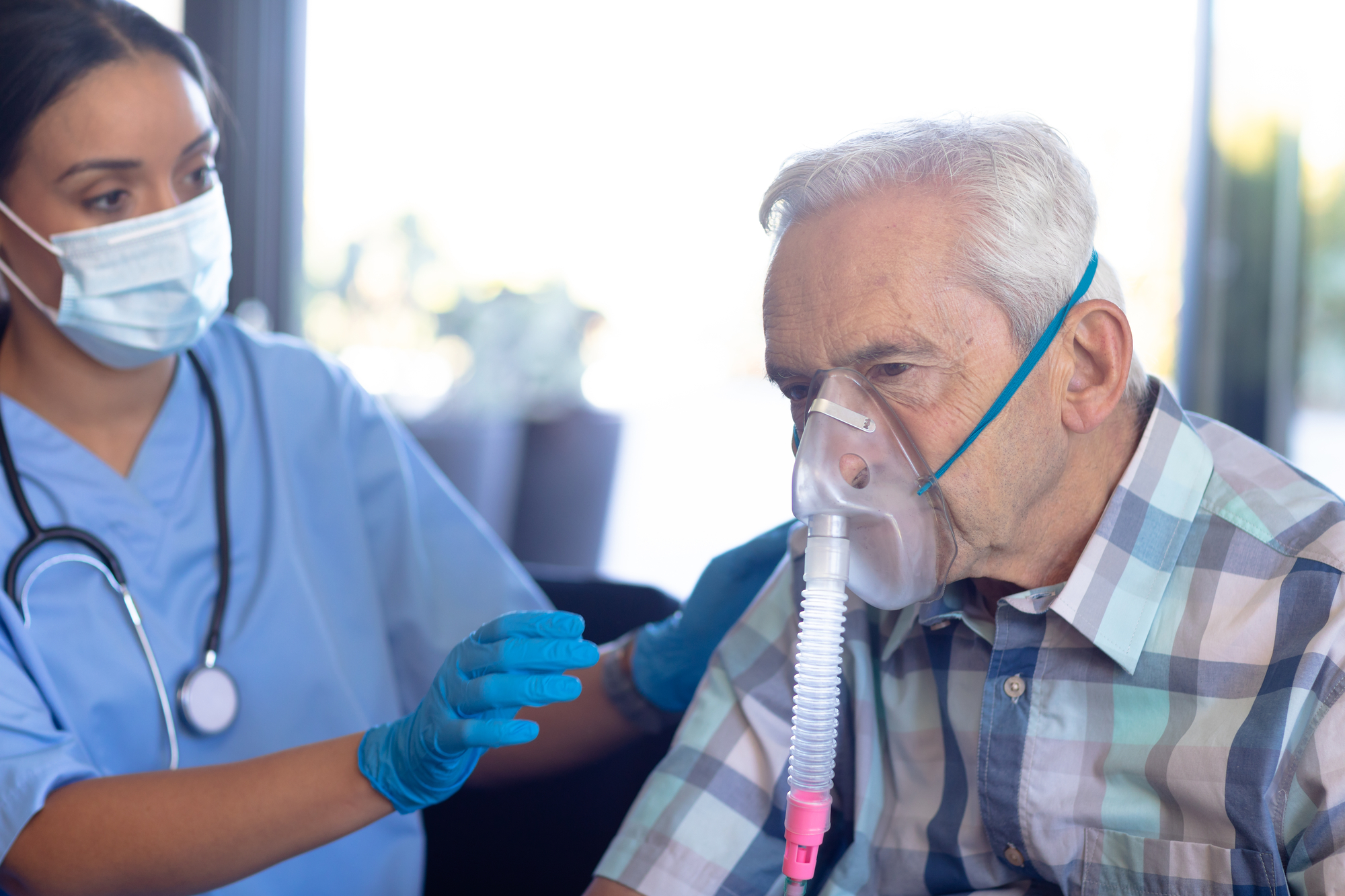Elderly man with oxygen mask 